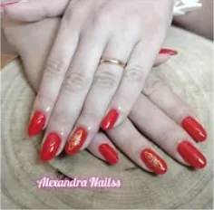 Trabalho de manicure em tom vermelho, fotografia do arquivo Facebook